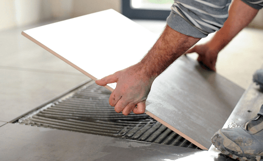 floor tile installation using E-MIX Tile adhesive